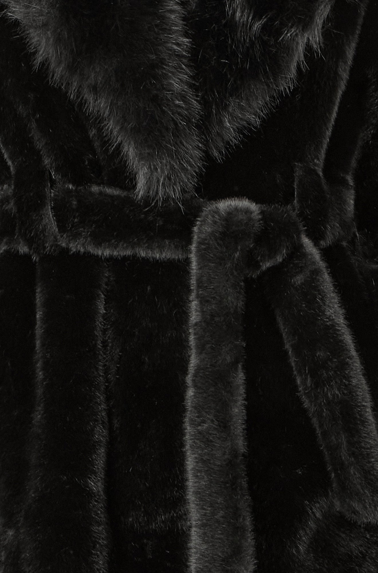 Close-up of a black plush robe with fur trim