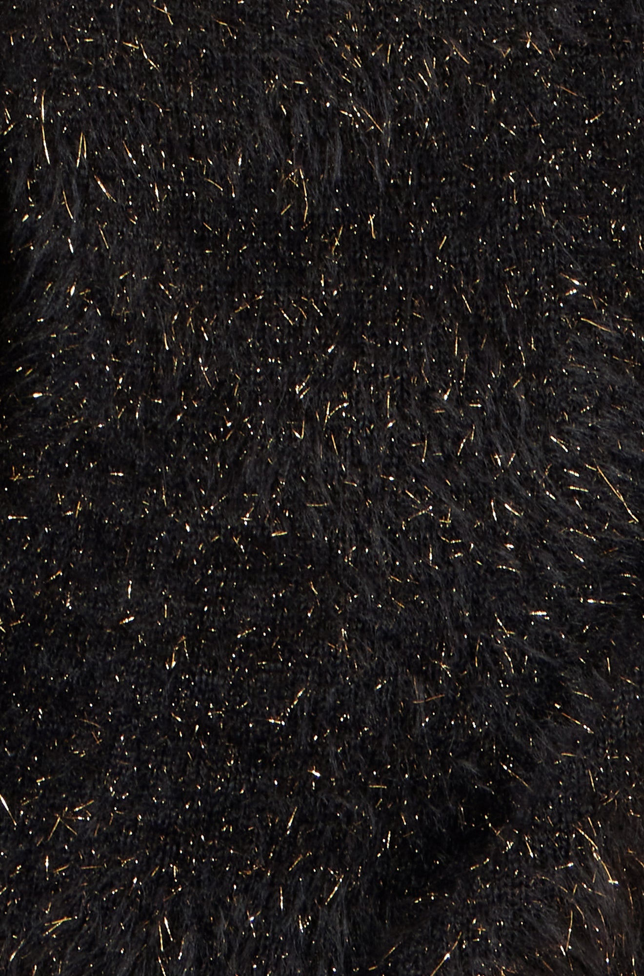 Close-up of a textured black fabric surface